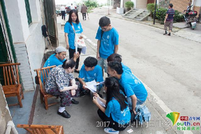 球探体育足球志愿者探访老街 为灾后修复建言献策